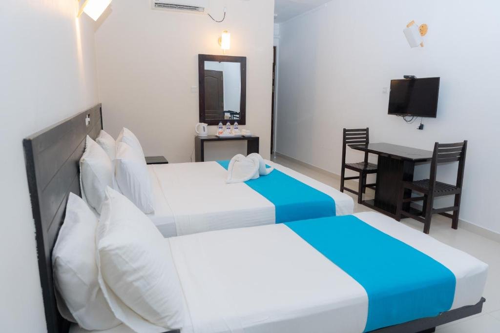 Deluxe Triple Room with Sea View